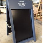 a board with fixed chalkboard display