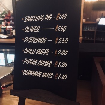 chalkboard easel for displaying snack and drink prices