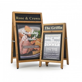 pair of a boards with headers of pub name and poster snap frames